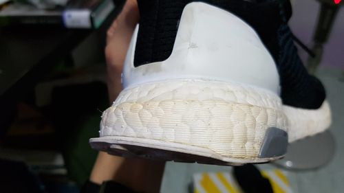 What causes the white ADIDAS Ultra Boost / NMD BOOST Midsole to turn yellow?